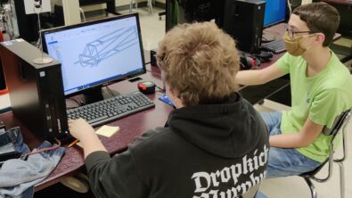 Students using Solid Edge CAD software