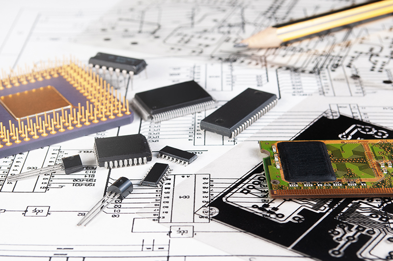 Electronic circuit board, pencil, processor and components on a schematic circuit diagram representing semiconductor design